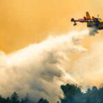 Wildfire southwest of Denver forces thousands to evacuate and destroys more than 160 structures
